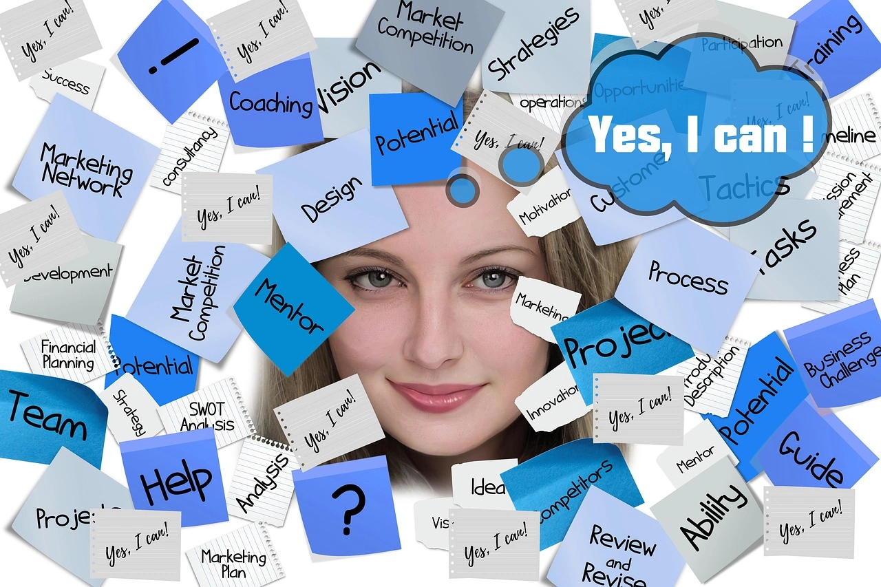 woman's face surrounded by motivational business post-its