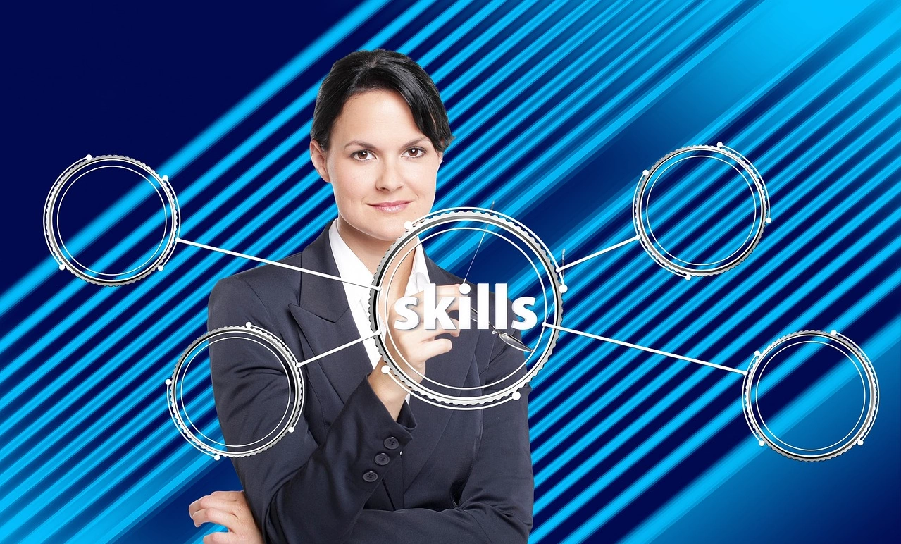 woman in business suit with skills bubble in front of her
